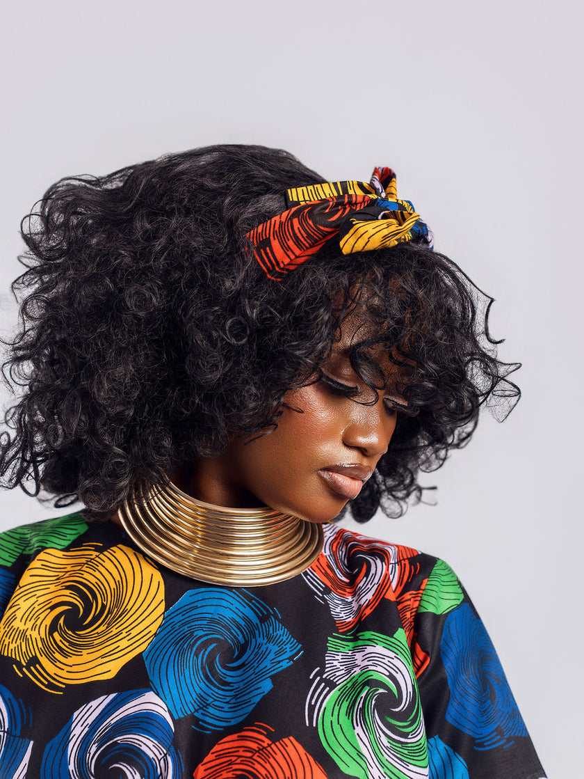 Close-up neck view of the swirl Peplum Top