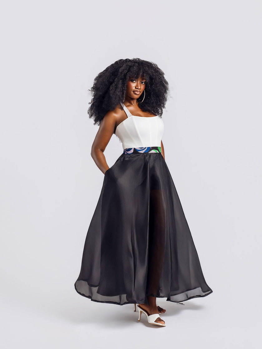 A model wearing Amazin Apparels unlined black organdy maxi skirt 