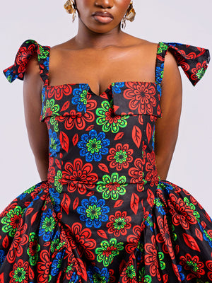 Close-up showing the hip pleating and smooth side panels of the Sculpted Floral Gown, designed for an hourglass silhouette.