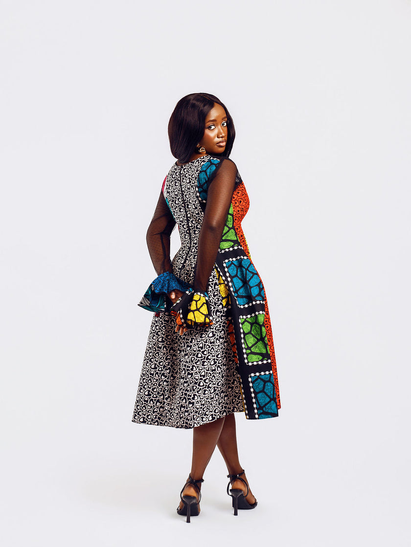 Back-view of a model wearing Doris Mixed Ankara Print Dress | Amazin Apparels - AmazinApparels