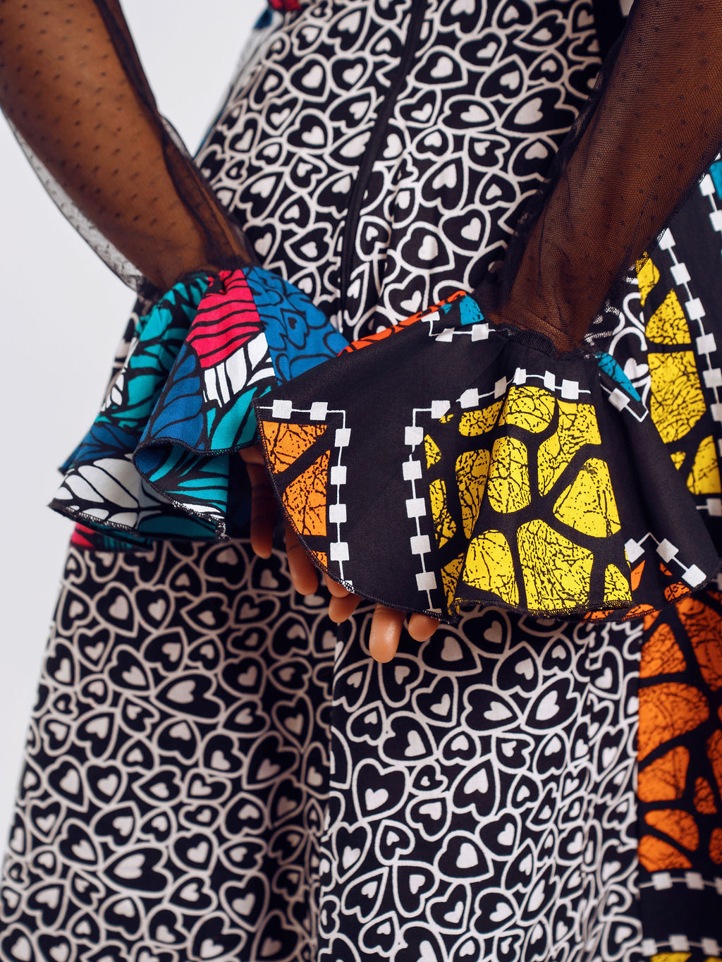 Close-up hand view of Doris Mixed Ankara Print Dress | Amazin Apparels - AmazinApparels