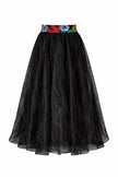 Front view of a sheer, unlined black organdy maxi skirt with two hidden pockets on both side, on a white background.