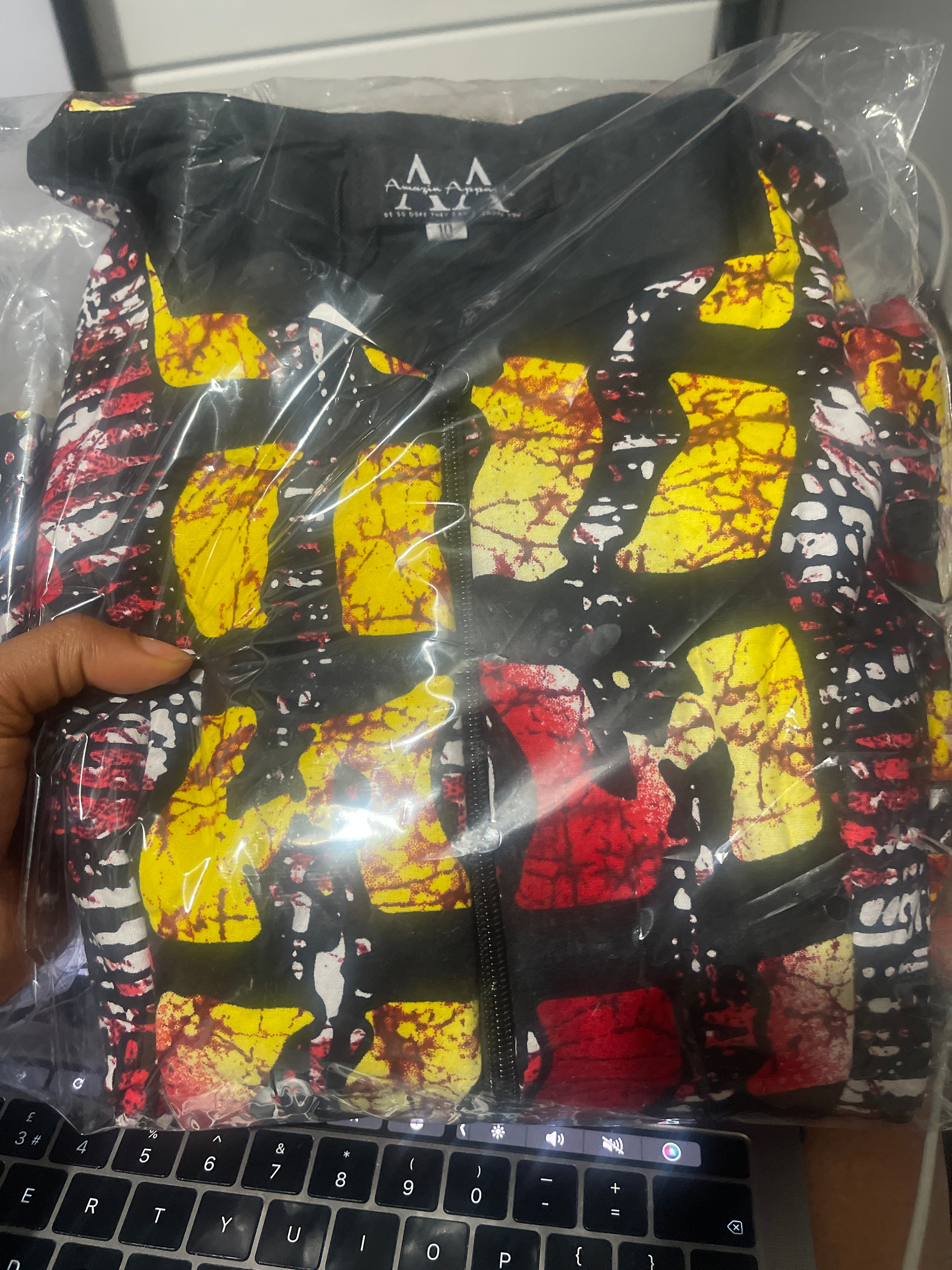 front-view of Seyi Ankara Peplum Top packed in a see through packing nylon 