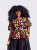 Close-up Front-view of a model wearing the Seyi Ankara Peplum Top 