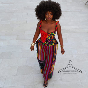 Ànìké Corset – African print Ankara bustier top featuring a sweetheart neckline, braided straps, structured silhouette, and lace-up back. Handmade from vibrant multicoloured heart-patterned cotton fabric, this corset blouse blends traditional Ankara style with modern elegance, making it perfect for weddings, cultural events, parties, and special occasions.